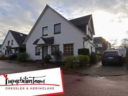 Exklusives Wohnen in Halstenbek – Komfortable 3 Zi.-Erdgeschosswohnung mit Garten, Terrasse & Garage