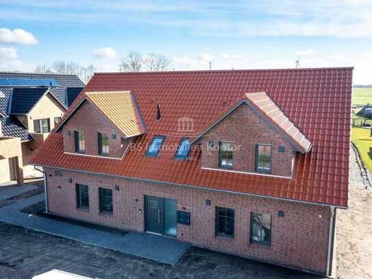 Neubauwertige Wohnung im OG rechts mit Balkon und Carport in zentraler Lage!