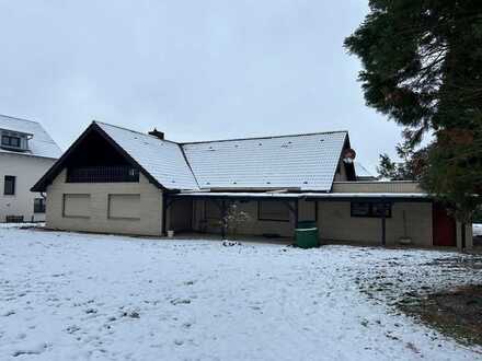 Winkelbungalow in ruhiger Lage von Waldbüttelbrunn mit großem Garten