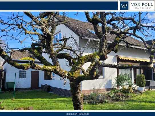 Einfamilienhaus mit Garage auf Sonnengrundstück