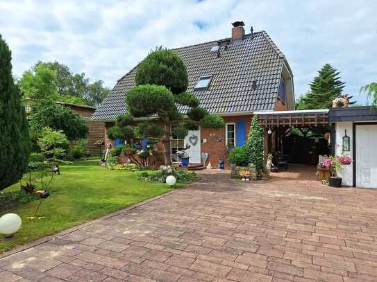 Gepflegtes Einfamilienhaus mit Garage, Carport und Teich unweit von Greifswald