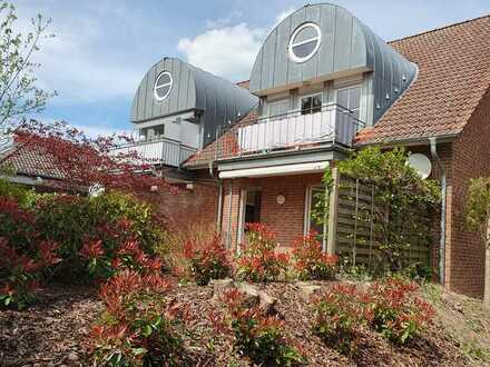 Attraktive Erdgeschoss-Wohnung mit Terrasse und Gartenanteil, 2 Stellplätze