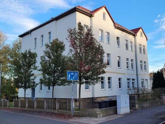 3 Zimmerwohnung im Erdgeschoss mit Loggia und Gemeinschaftsgarten