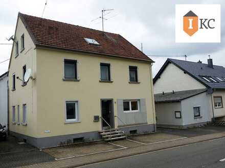Mehrfamilienhaus mit Nebenhaus - 5 Wohnungen - Losheim am See
