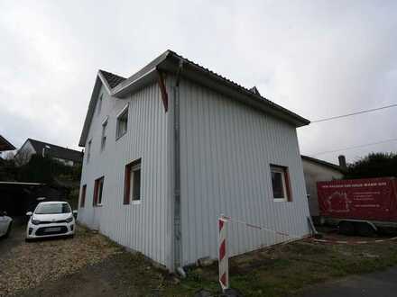 Ländliche Doppelhaushälfte mit Zusätzlichen Altbau.