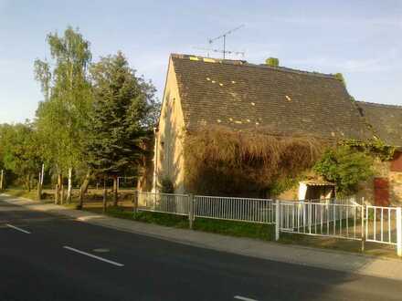 Grundstück mit baufälligem Einfamilienhaus