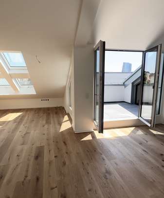 Neubau DG-Wohnung mit Dachterrasse in Toplage