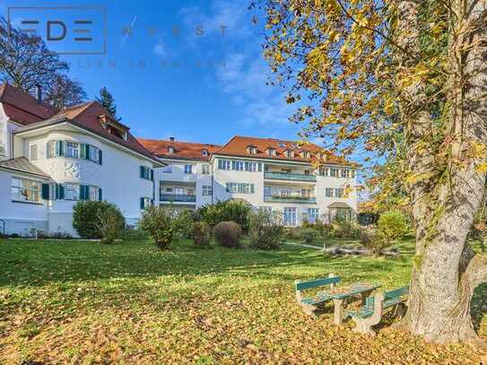 Exklusive Dachgeschosswohnung in historischem Gebäude mit Alpenblick!