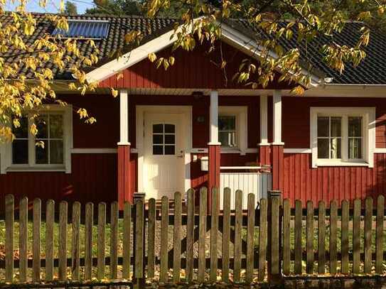 Finnisches Holzhaus am Stechlin mit Sauna und Kamin