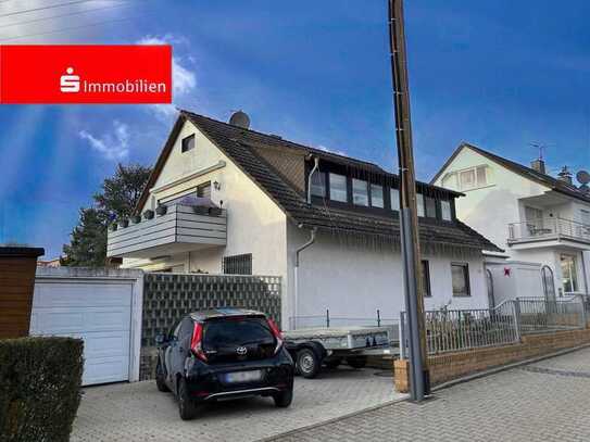 Für die große Familie: Zweifamilienhaus mit Wohnraumreserve in Top- Wohnlage von Frankfurt-Zeilsheim