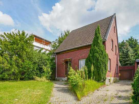 Freistehendes Einfamilienhaus mit sonnigem Grundstück!