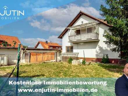 Einfamilienhaus mit Einliegerwohnung, Keller, Garage, Balkon, Terrasse und traumhaften Garten