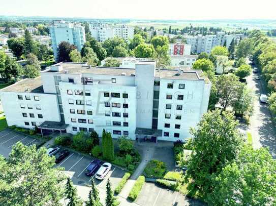 3,5-Zimmer-Erdgeschosswohnung mit Südwest-Loggia und Tiefgaragenstellplatz in idyllisch gelegenem, b