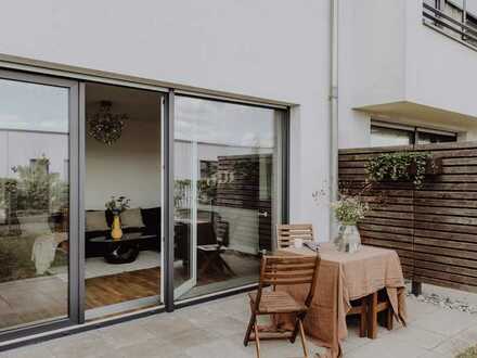 Modern geschnittene 3 Zimmerwohnung mit großer Sonnenterrasse und eigenem Garten