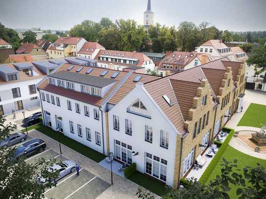 Wohnen im Rittergarten – KfW-geförderte 2-Zi.-Wohnung mit großem Wohnbereich und sonniger Terrasse