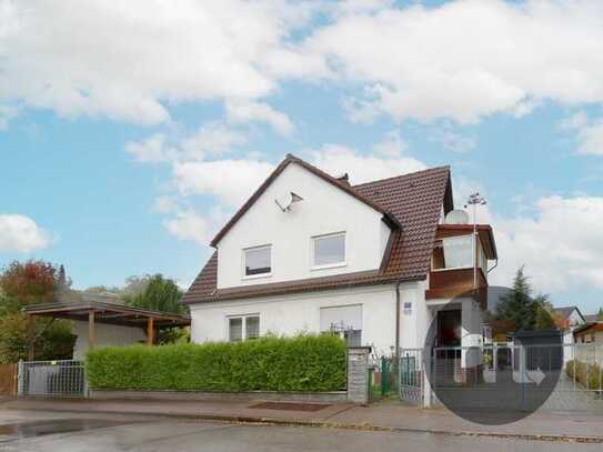 Perfektes Familienidyll: Großes Einfamilienhaus mit Einliegerwohnung und Terrasse in grüner Umgebung