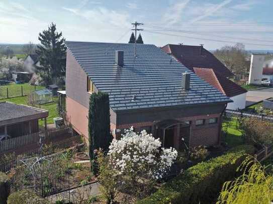 RESERVIERT - Traumhaftes Einfamilienhaus mit wunderschönem Garten – Ihr Blick ins Grüne!