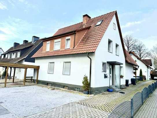 Charmante Familienwohnung mit Balkon und Garten.