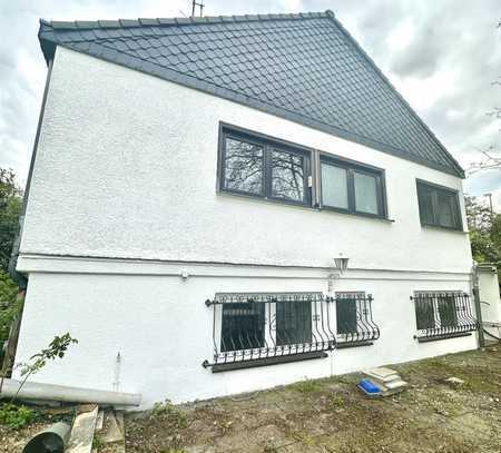 Einfamilienhaus in idyllischer Siedlung mit grüner Ruheoase