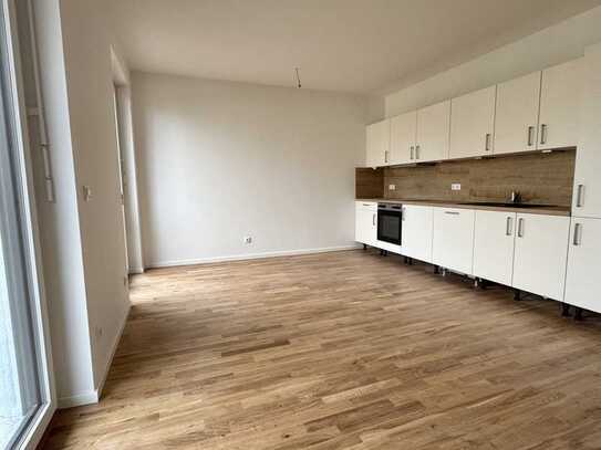 Hochwertiger Erstbezug: 4-Raum-Wohnung mit Gäste-WC, Balkon und moderner Einbauküche