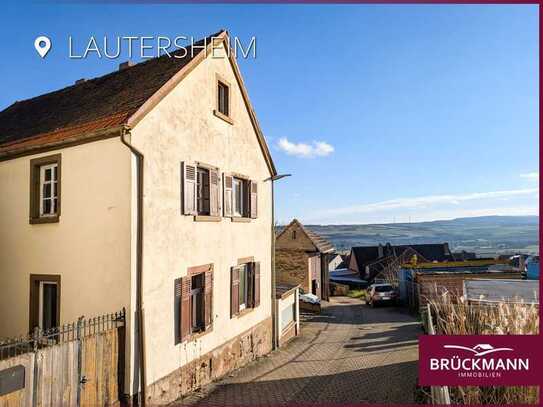 Handwerker aufgepasst: Sanierungsbedürftiges Einfamilienhaus mit kleinem Garten & Weitblick!