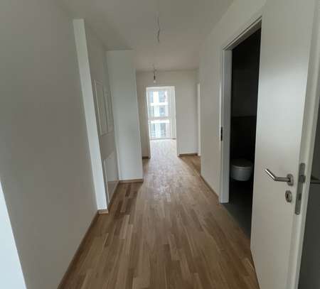 Erstbezug Neubau 6. OG, EBK+TG-Stellplatz: Stilvolle 2,5-Raum-Wohnung