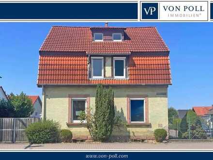 Renovierungsprojekt mit Potenzial: Zweifamilienhaus in zentraler Lage