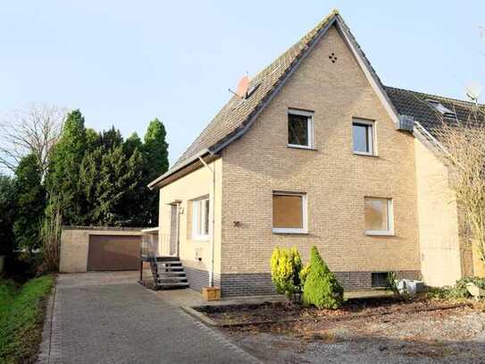 Angebautes Einfamilienhaus mit Garage