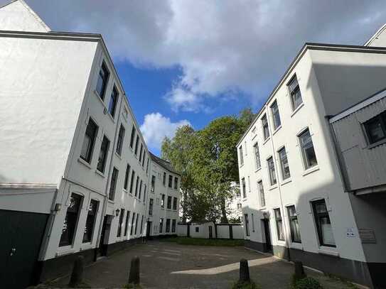 Eigene Terrasse im Hinterhaus 2-Zi.-Whg. zum Erstbezug