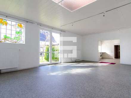 Außergewöhnliche Erdgeschosswohnung mit "Loft-Charakter", Bestlage in Unterhaching!