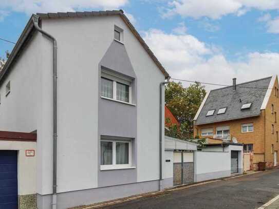 Zögern Sie nicht: Modernes Einfamilienhaus mit Garten und einer Garage