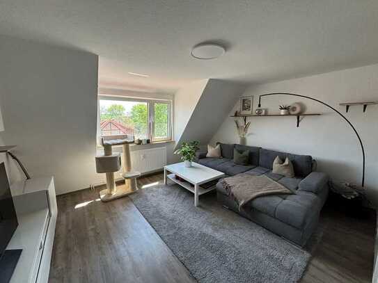 Sanierte 4 Zimmer Eigentumswohnung mit Garten und Keller in Weddel