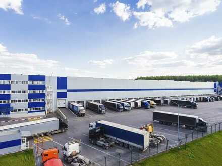 Moderne Lager-/Logistik-/Produktionshalle mit Rampen in Autobahnnähe(Beispielfoto)
