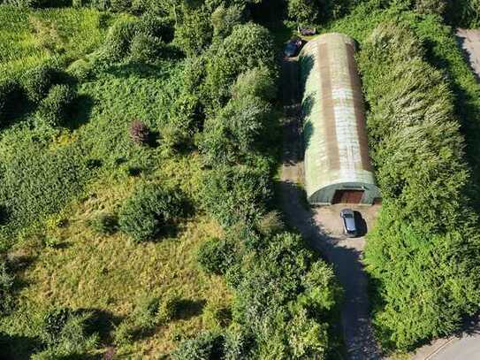 Vielfältige Möglichkeiten: Baugrundstück mit Allzweckhalle im Mischgebiet