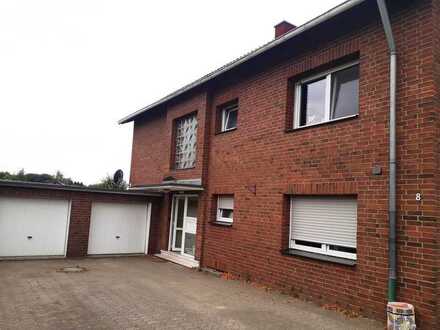 ruhig gelegene 3-Zimmerwohnung mit Terrasse, Garten und Garage