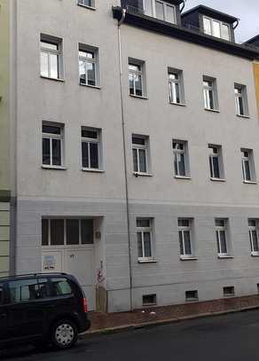 Dachgeschosswohnung mit Balkon und Einbauküche