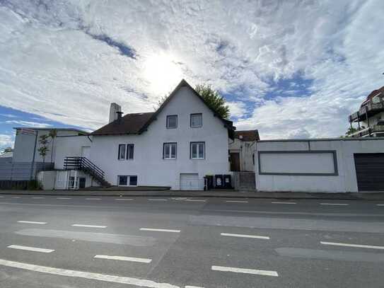 Attraktives Mehrfamilienhaus mit Gewerbeanteil in Rheinnähe