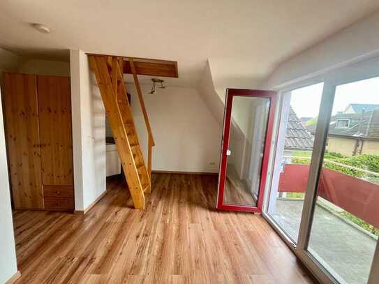 Geschmackvolle 1,5 -Zimmer-Single-Wohnung mit Fußbodenheizung, Balkon und EBK in Lübeck Travemünde