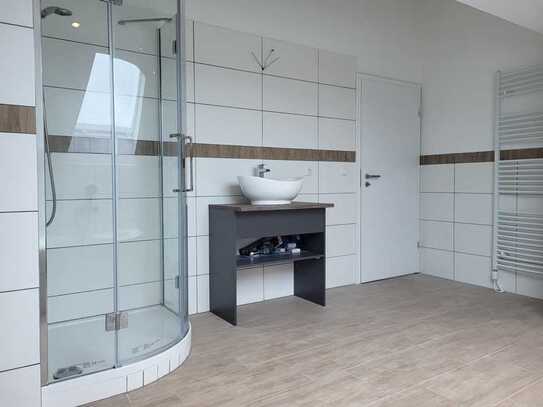 Erstbezug - Außergewöhnliche Dachgeschosswohnung im Zentrum von Mellendorf