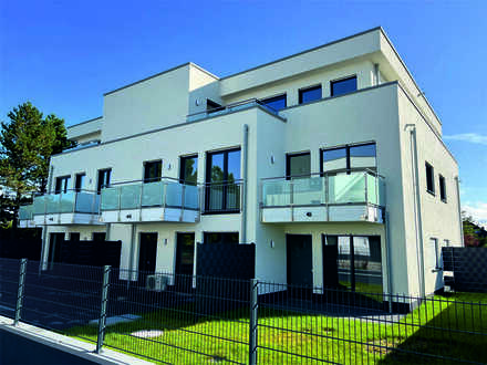 hochwertige Neubauwohnung in Bestlage - Top Ausstattung, eigener Gartenanteil u. Klimatisierung inkl
