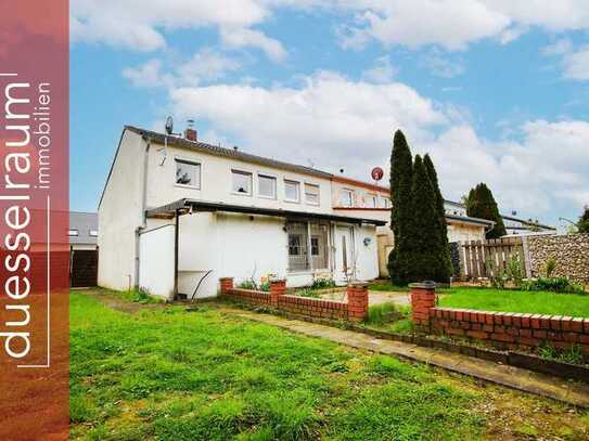 Reihenendhaus in Unterrath mit viel Potenzial: Sanierungsbedürftig mit Garten & Stellplatz