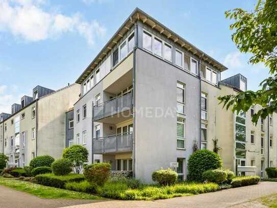 Ruhig gelegene, sonnige ETW mit 55m² Nutzfläche, Dachterrasse mit Parkblick und bestem Anschluss