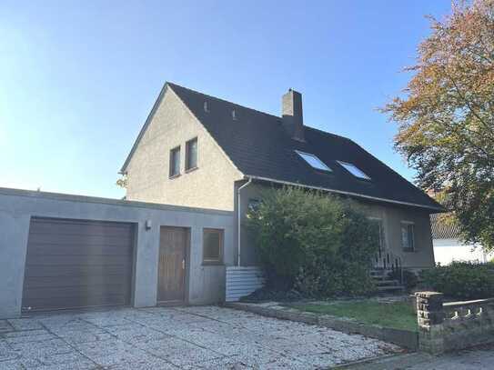 PURNHAGEN-IMMOBILIEN - 1-2-Fam.-Haus mit Wintergarten und Garage in zentraler Lage von Neuenkirchen