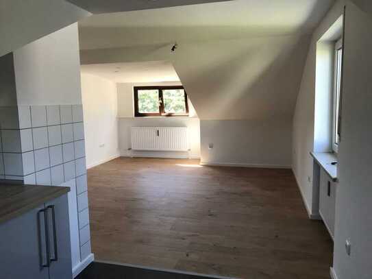 Gemütliche helle Dachgeschosswohnung in Neubiberg