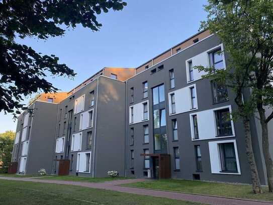 Stilvolle Einzimmerwohnung mit großzügiger Terrasse im Grünen