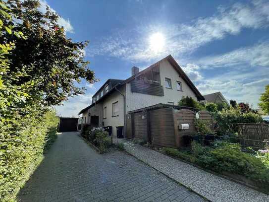 Gepflegte 3-Zimmer Wohnung mit Balkon und eigenem Gartenanteil