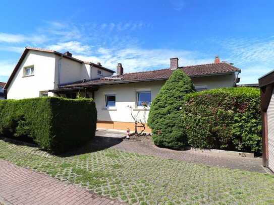 Ihr Weg ins Eigenheim – Charmantes Siedlungshaus als DHH mit Garten & Carport in gefragter Wohnlage