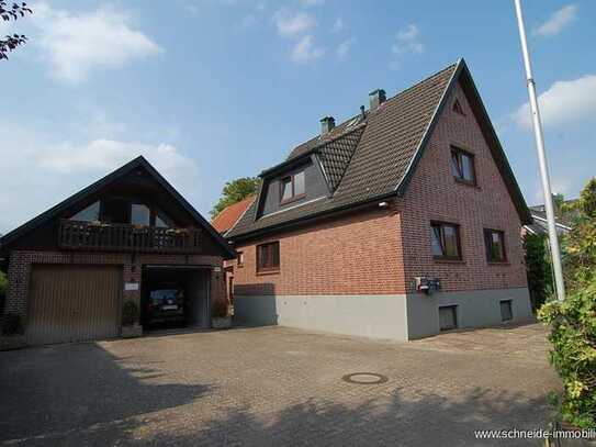 Mehrfamilienhaus mit 3 Wohneinheiten, Wirtschaftsgebäude, großzügigen Nebenflächen und großen Garten