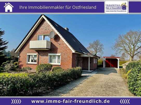 Einfamilienhaus mit Balkon, Kaminofen und Wintergarten in Wiesederfehn