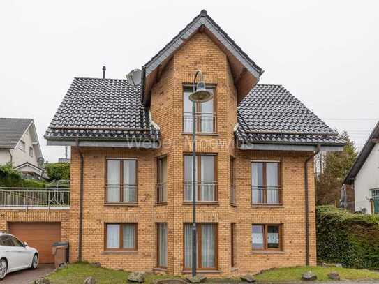 Freistehendes, topgepflegtes Einfamilienhaus mit Einliegerwohnung, Kamin, Terrassen, Garten u.v.m.